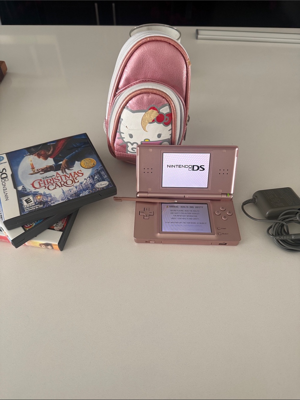 Nintendo DS Lite Pink Handheld Console with Hello Kitty Case & 3 games